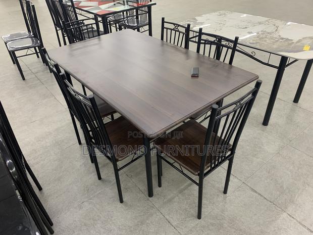 Wood Dining Table With 6 Chairs · Photo 2