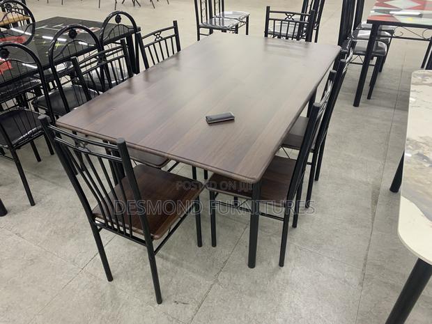 Wood Dining Table With 6 Chairs · Photo 1