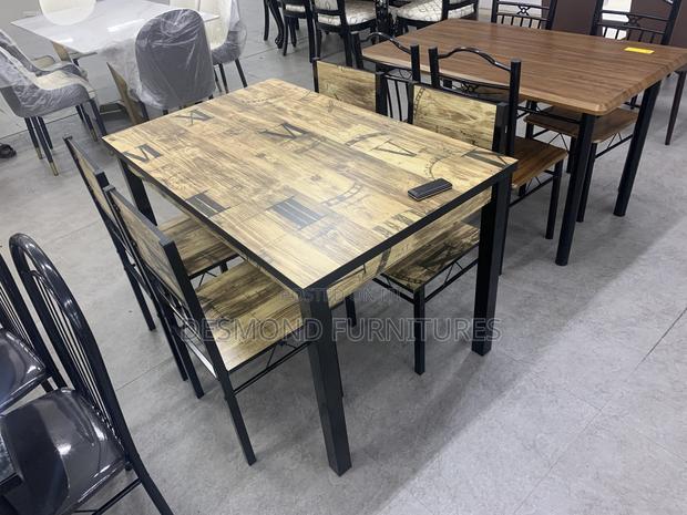 Wood Dining Table With 4 Chairs · Photo 1