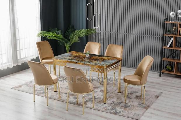 Extendable Dinning Table With 6 Chairs · Photo 1