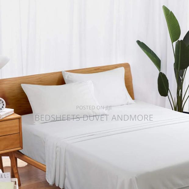 Hotel White Bedsheet · Photo 2