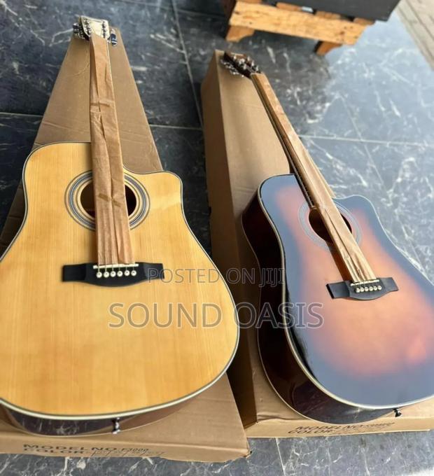 Yamaha and Givson Acoustic Guitar · Photo 2