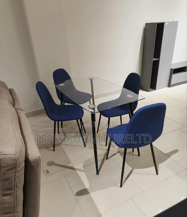 Glass Dining Table With 4 Chairs · Photo 1