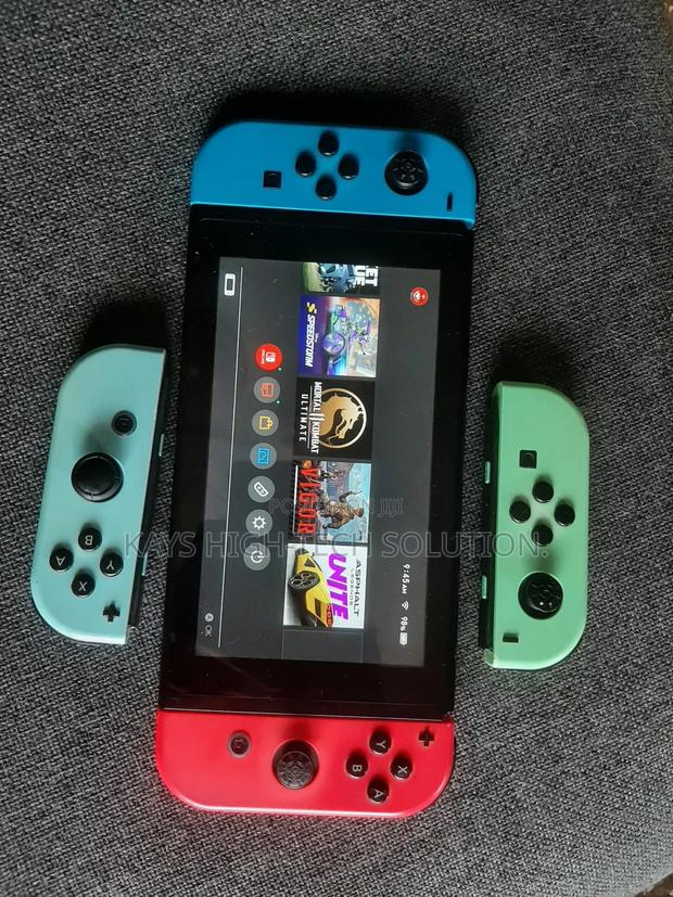 Nintendo Switch With Mk 1 Other Games and Accessories · Photo 4