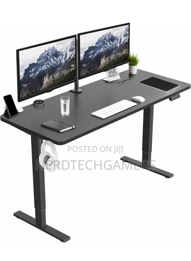 VIVO Electric Height Adjustable 60 X 24 Inch · Photo 1