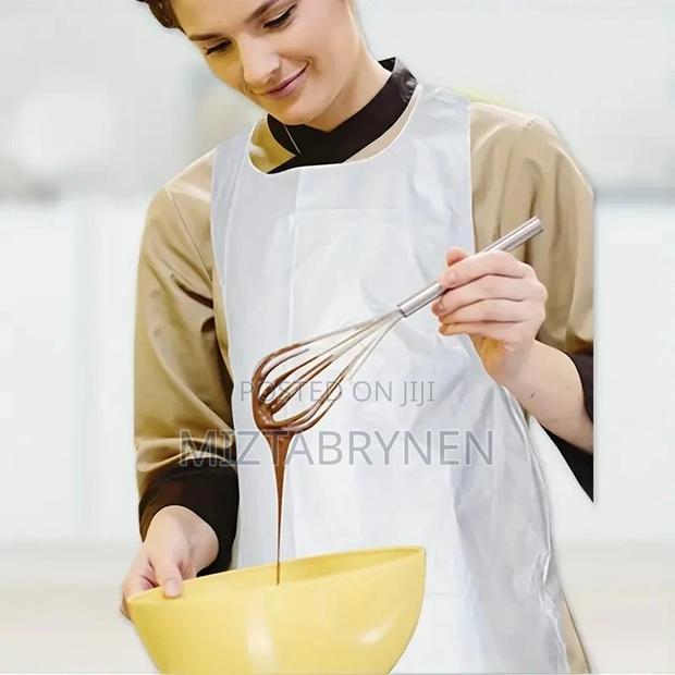 Disposable White Poly Aprons - 100 Pieces photo 4