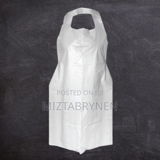 Disposable White Poly Aprons - 100 Pieces