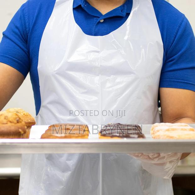 Disposable White Poly Aprons - 100 Pieces photo 2