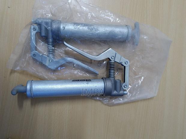 Manual Grease Gun: Pistol-Grip Handle, Cartridge Load, Rigid