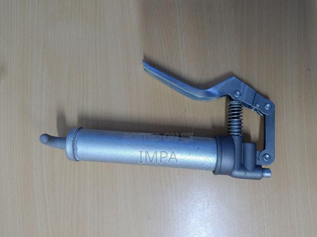 Manual Grease Gun: Pistol-Grip Handle, Cartridge Load, Rigid photo 2