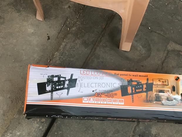 Flexible Tv Bracket for Tv Between 32”-80” · Photo 3