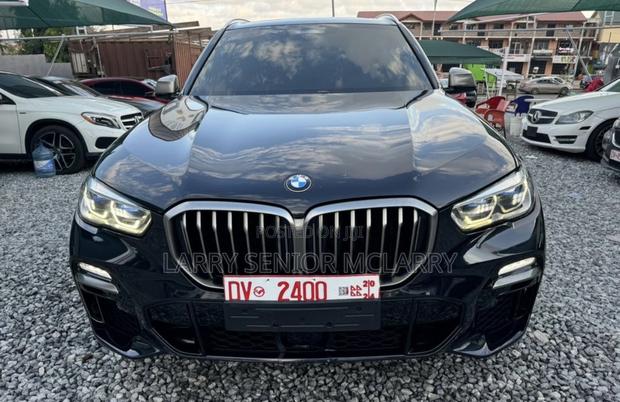 BMW X5 M50i AWD 2020 Black · Photo 1