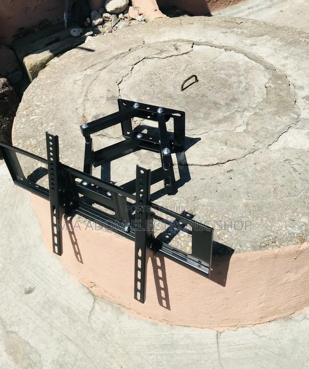 Order Quality Adjustable Wall Mount for Tv Between 32-80” · Photo 2