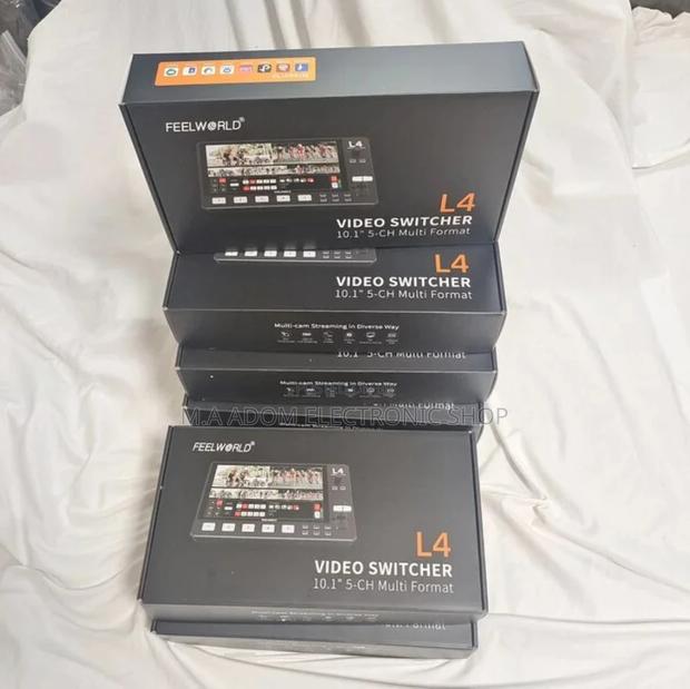Feel World L4 Video Switcher Canon Battery · Photo 2
