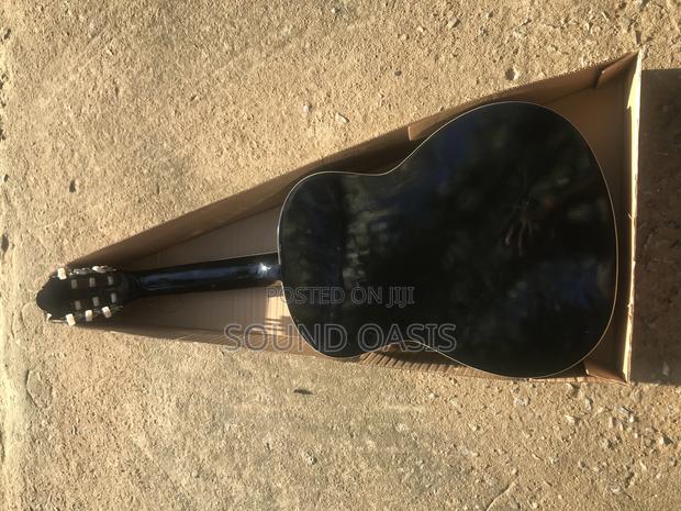 Black Acoustic Guitar · Photo 4