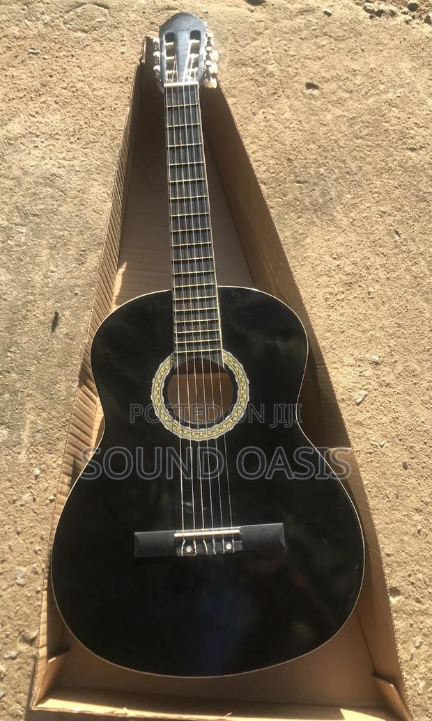 Black Acoustic Guitar · Photo 3