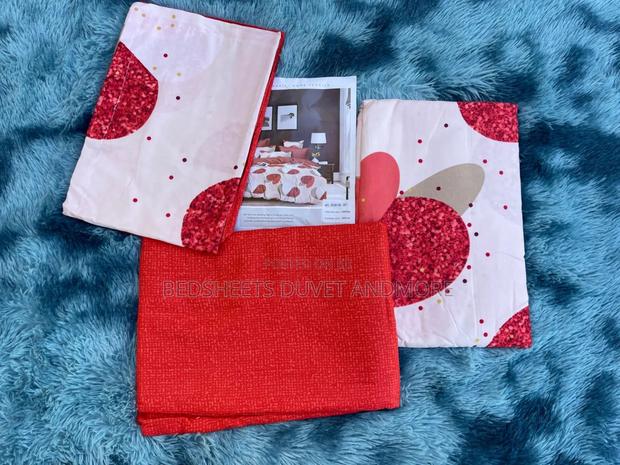 Red and White Bedsheet · Photo 2