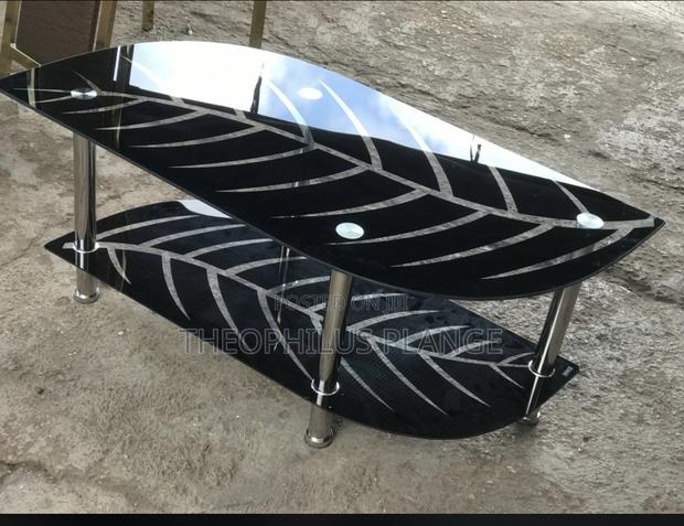 Leaf Design Glasses Center Table. · Photo 1