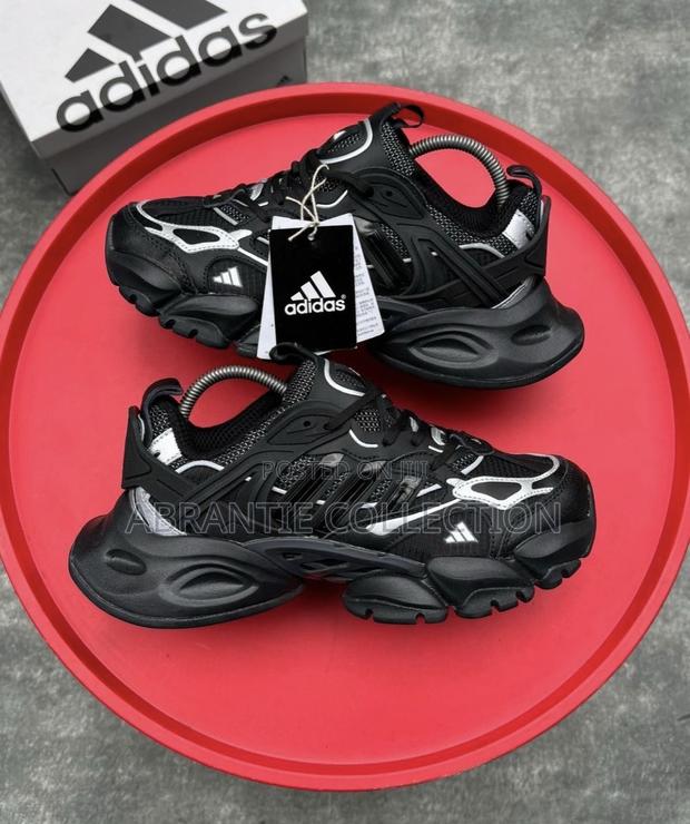 Adidas XLG Runner Deluxe · Photo 4