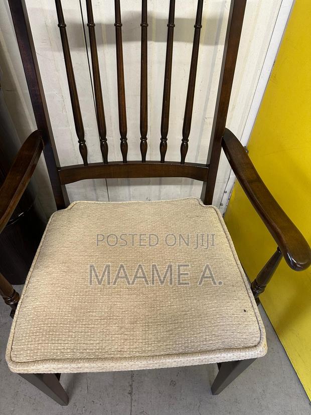Dark Brown Wooden Chair · Photo 1