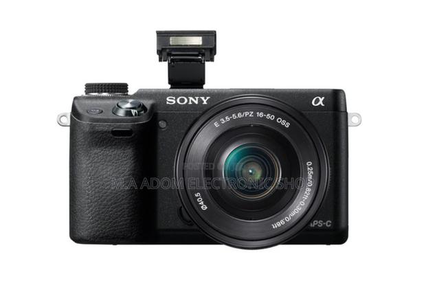 Sony Alpha NEX-6 Mirrorless Digital Camera-Flash Up View · Photo 2