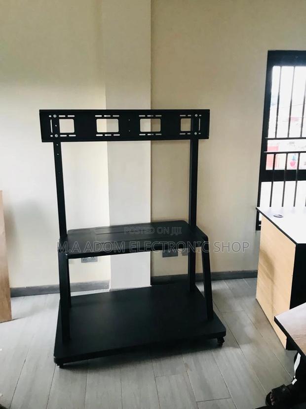 Heavy-Duty Mobile TV Stand - Sturdy and Stylish · Photo 2
