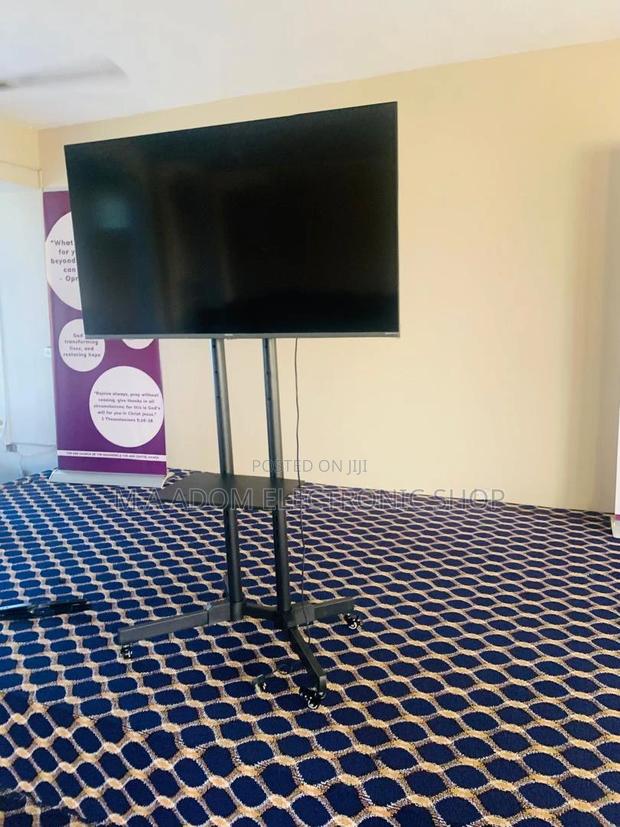 Sleek and Functional: Mobile TV Stand for 32”-70" TVS · Photo 2