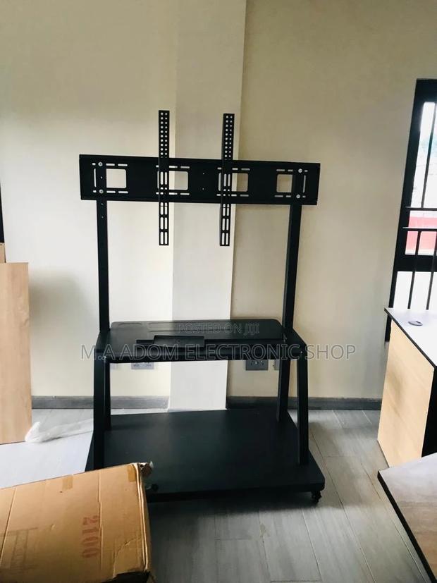Versatile Mobile TV Stand for Your Home Theater · Photo 2