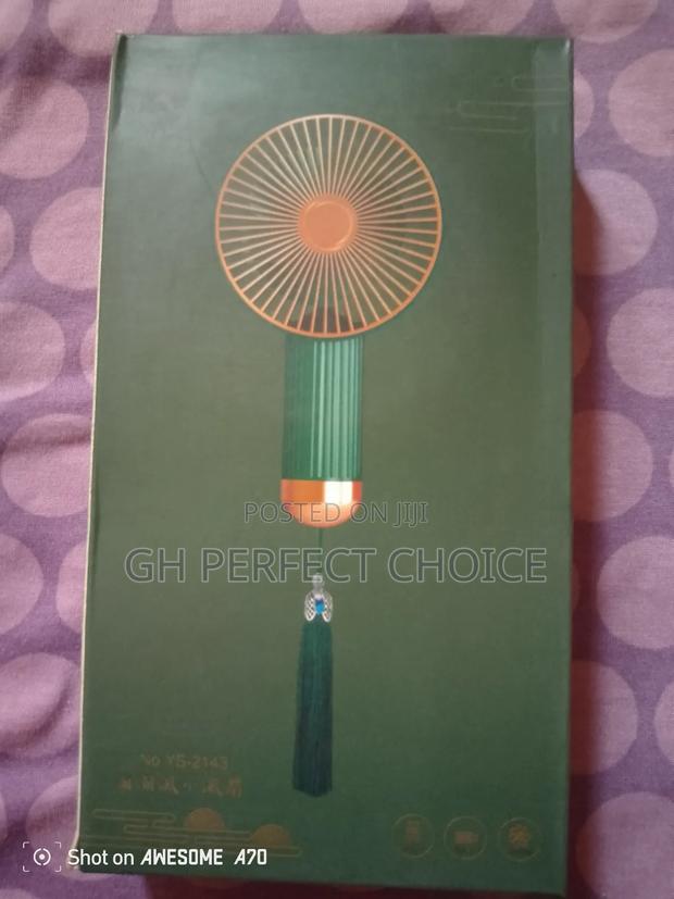 Mini Cooling Device - Hand Fan · Photo 2