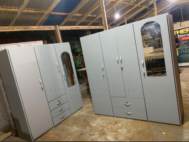 Laminated Three Doors Wardrobe. Foreign Wood. · Photo 2