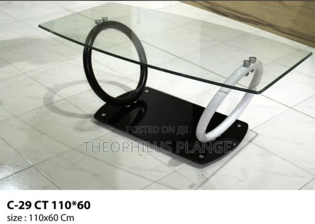 Glass Center Table With Ring Stand Design · Photo 2