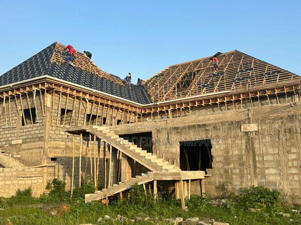 Concrete Parapet, Wood-Work Structure and Euro-Tiles · Photo 4