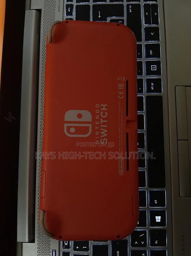 Nintendo Switch Lite With Fc 25, Mk 11 Other Games · Photo 4