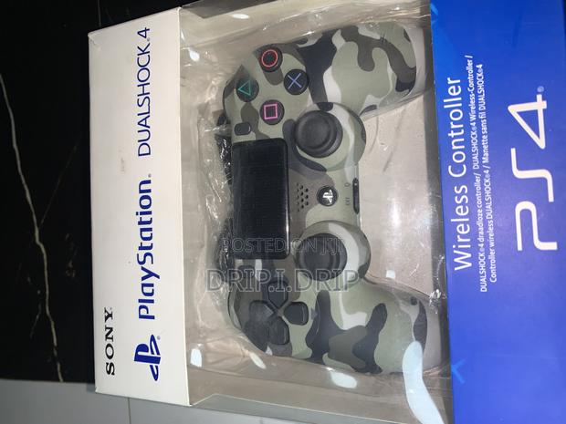 PS4 Wireless Dual Controller.Brand New · Photo 4