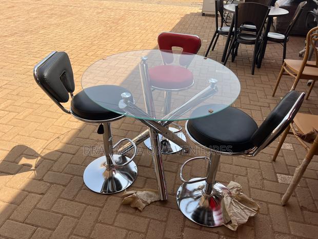 Tempered Glass Table With 3 Adjustable Chairs · Photo 2