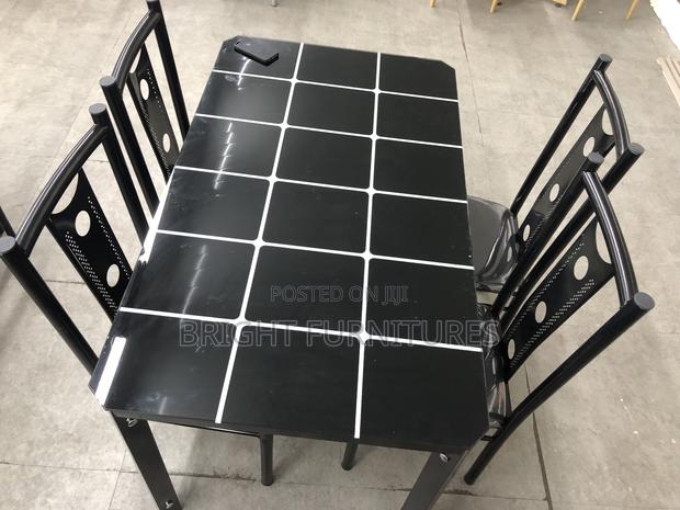 Dining Table With Four Chairs · Photo 3