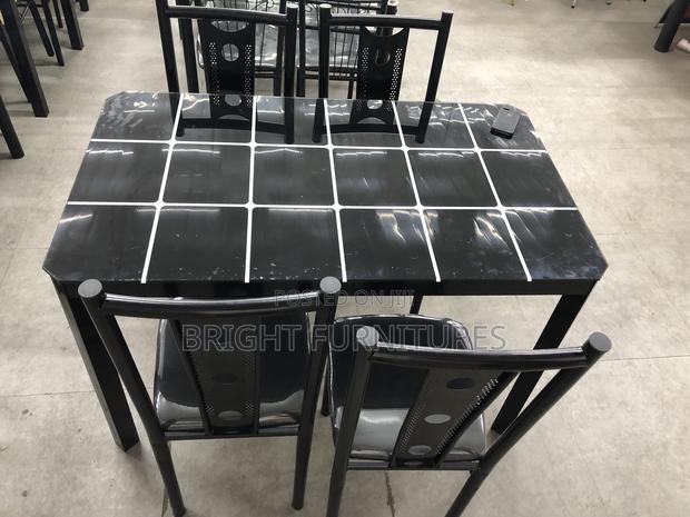 Dining Table With Four Chairs · Photo 4