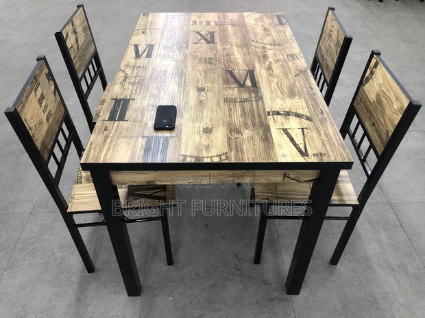 Importanted Wooden Dining Table With Four Chairs · Photo 3