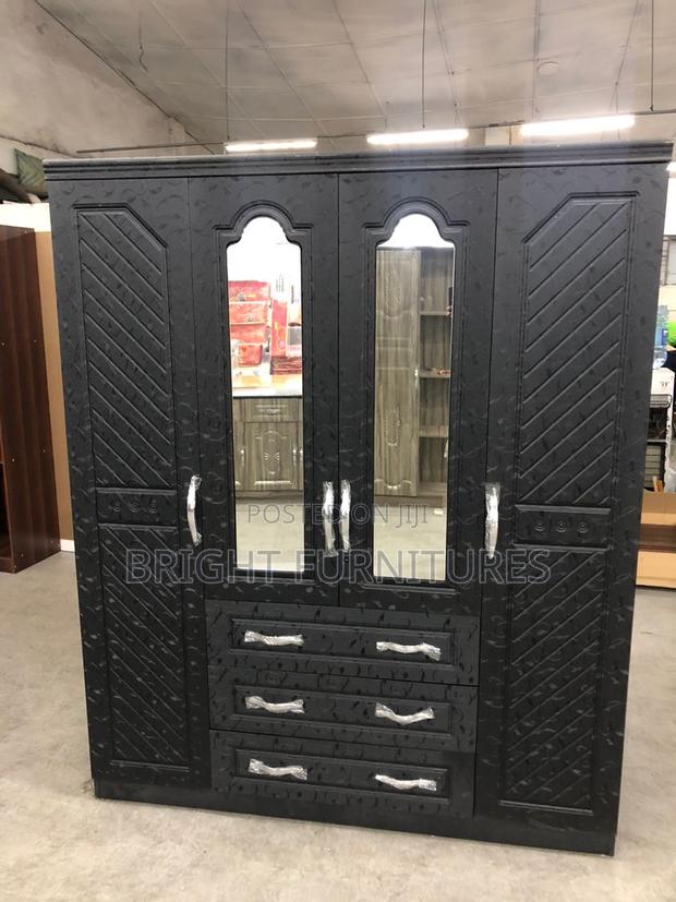 Foreign Four Doors Wardrobe With Mirror and Drowners · Photo 3