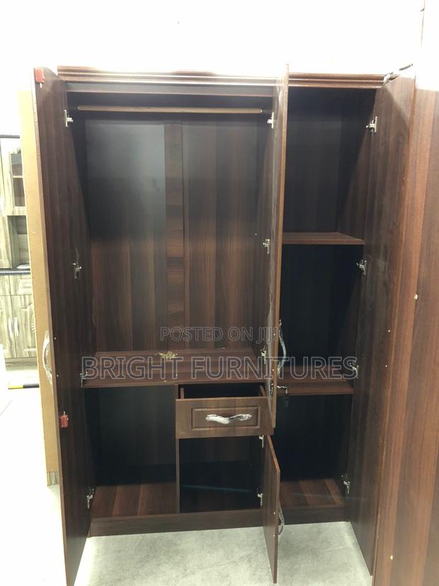 Foreign Three (3) Door Wardrobe With Mirror and Drowners · Photo 4