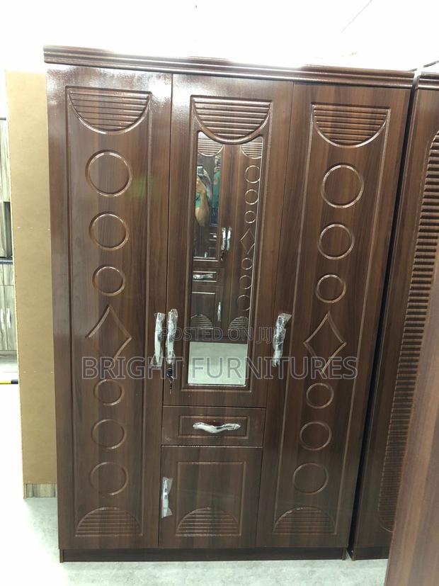 Foreign Three (3) Door Wardrobe With Mirror and Drowners · Photo 3