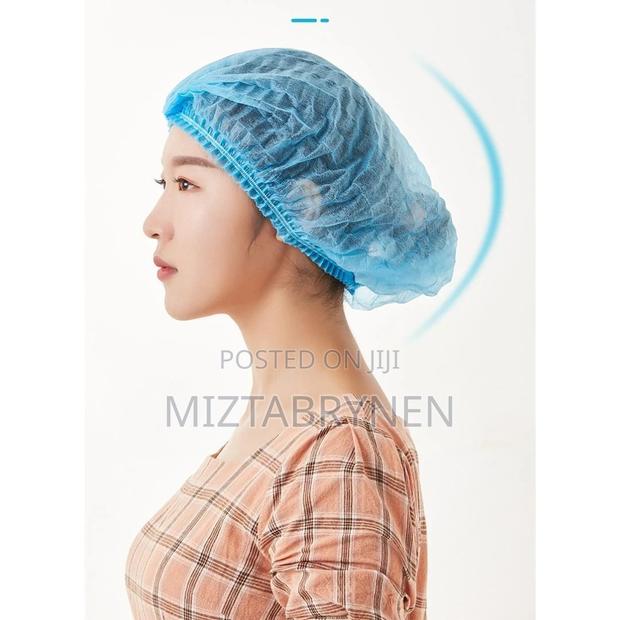 100 Disposable Non-woven Hairnets - Blue photo 2