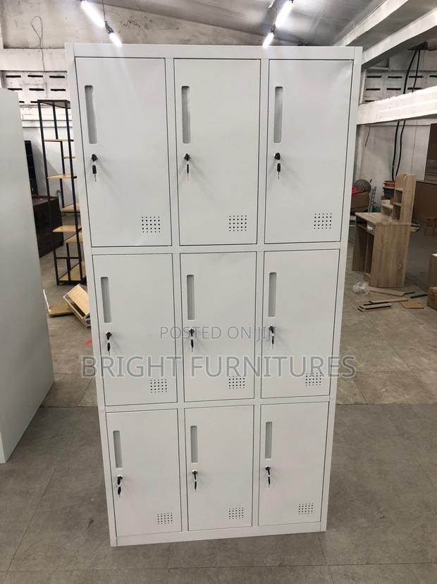 Office Cabinet With Nine (9) Lockers · Photo 3
