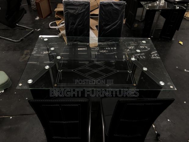 Quality Glass Dining Table With Four Chairs · Photo 2