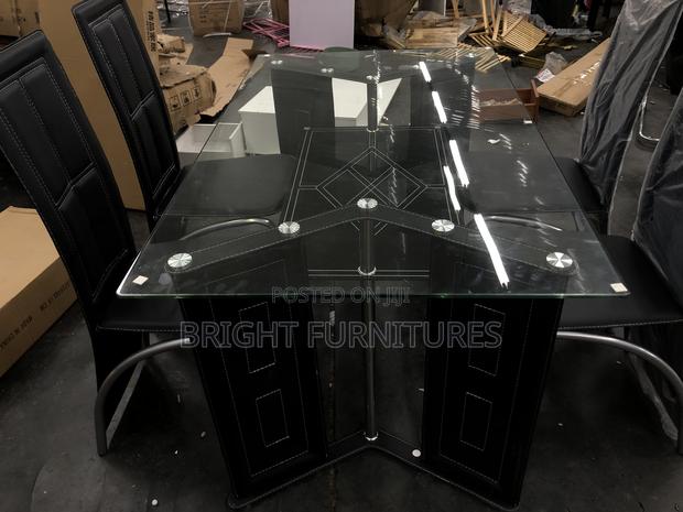Quality Glass Dining Table With Four Chairs · Photo 3