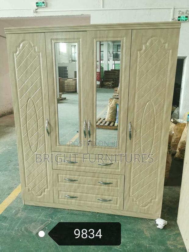 Four Doors Foreign Wardrobe With Mirror