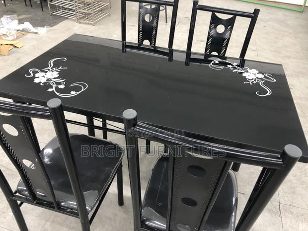 Dining Table With Four Chairs Available in Stocks · Photo 2