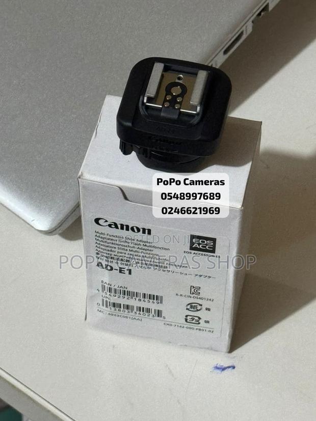 Canon Ad-E1 ( Speedlight Converter for Canon R50) · Photo 2