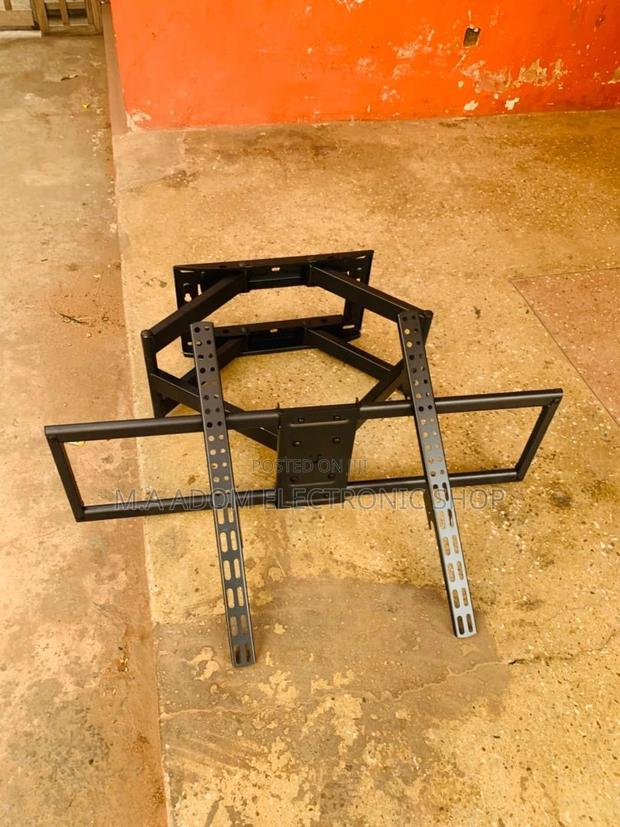 Dominate Your Viewing Angle: Adjustable TV Mount(32”-70”)Tvs · Photo 2