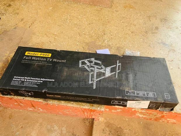 Rock-Solid Support: Heavy-Duty Wall Mount for 50"-120" TVS · Photo 2